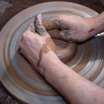 Doug Fitch and Hannah McAndrew making a jug for me